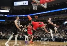 Alex Caruso is undergoing examination for a possible concussion