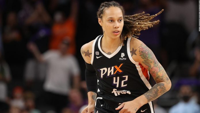 Brittney Griner is led into the Russian courtroom in cuffs