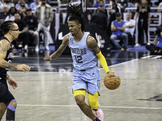 Ja Morant drinking tequila, throwing cash in a limo