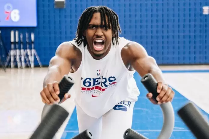 Tyrese Maxey celebrates after helping recruit LeBron James