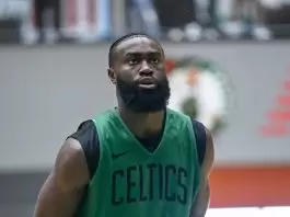Jaylen Brown pushing through a left hand injury