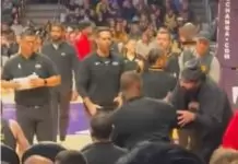 Fan kicked out after putting arms around LeBron James