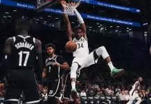 Giannis powers Bucks with 34 points in narrow win over Nets