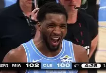 Mitchell leads Cavaliers past Heat to clinch playoff spot