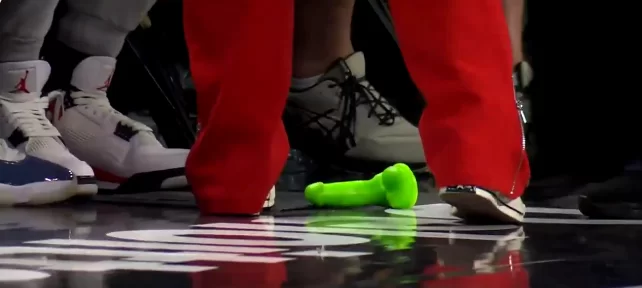 Fan throws green dildo onto WNBA court